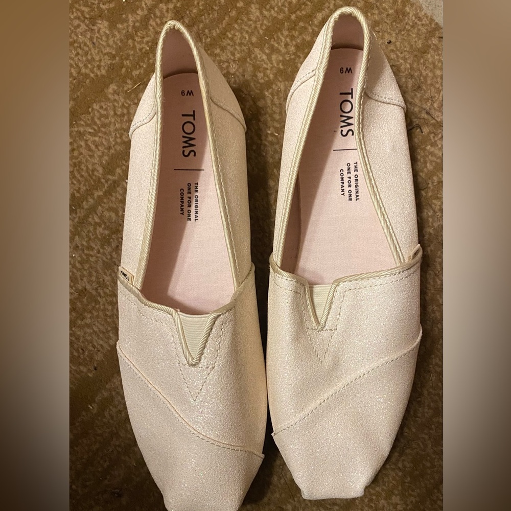 Women TOMS shoes, size 9, beige with sparkles, gently used condition, no box